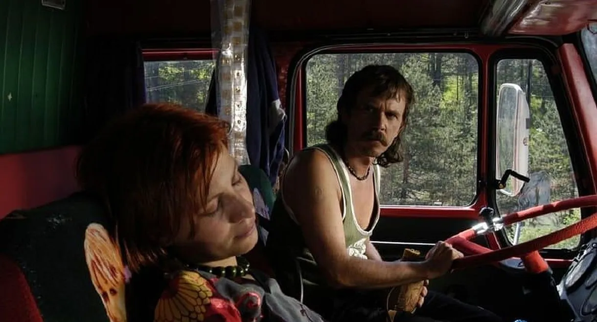 The Red Colored Grey Truck